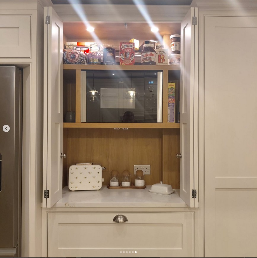 Luxury kitchen with integrated appliance cabinet