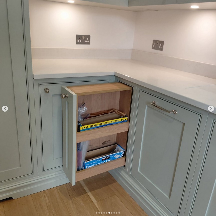 Kitchen with pull-out storage solutions and corner organization