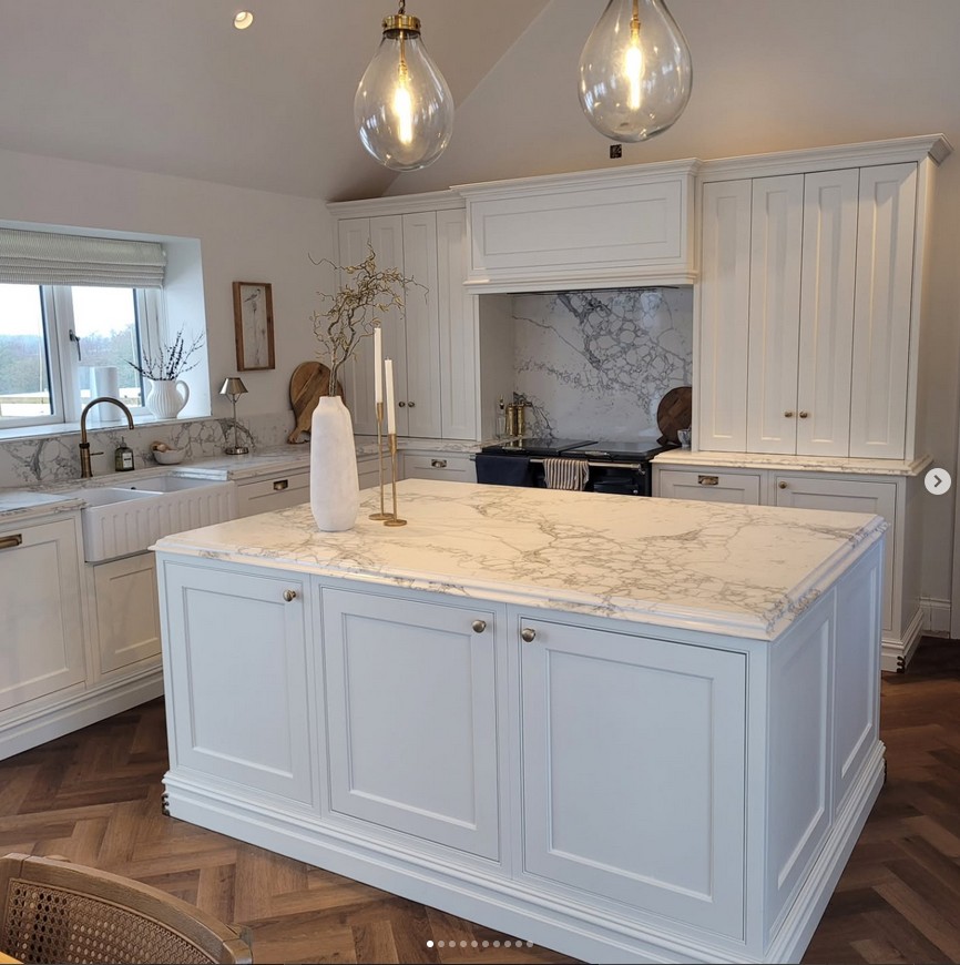 Made to measure kitchen with marble island and custom cabinetry
