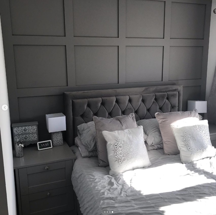 Bedroom suite with paneled feature wall and matching furniture