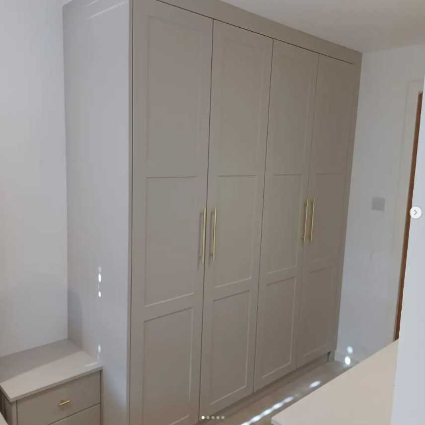 Contemporary fitted wardrobe with handleless design