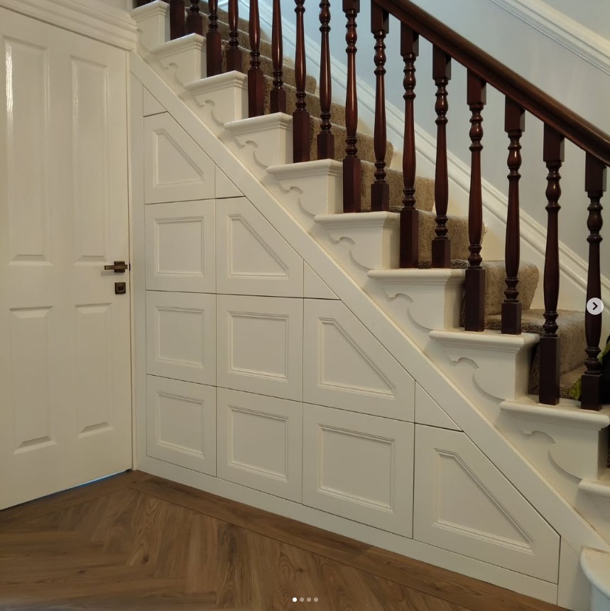 Bespoke under stairs storage with pull-out drawers