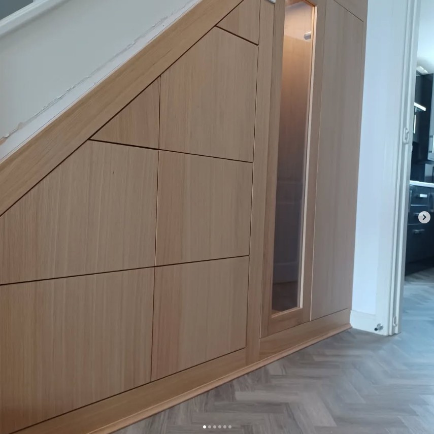 Bespoke under stairs cupboard with shelving