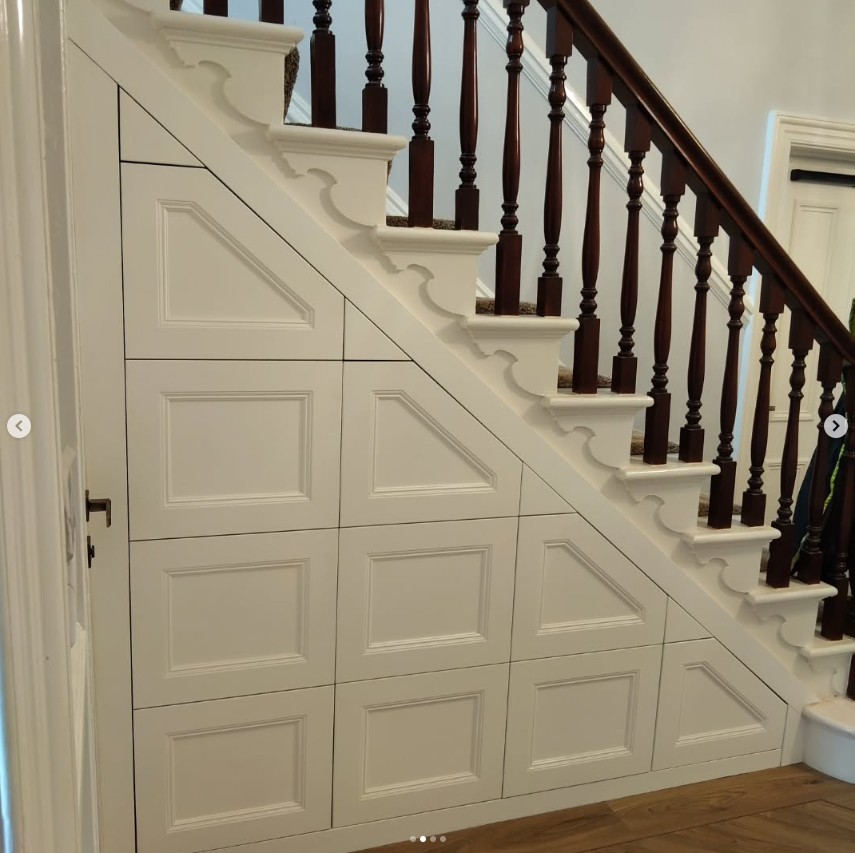 Under stairs storage with handleless cabinet doors