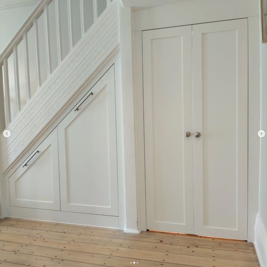 Custom under stairs storage with pull-out drawers